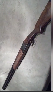 Break-action shotgun with a wood stock
